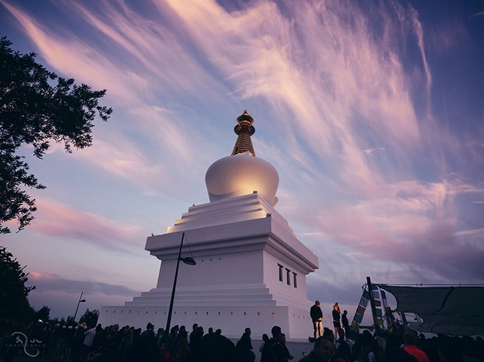 Buddhist meditation in front of Benalmedeana Stupa in Spain