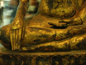 Journey to Wisdom Level 9, An image of a Buddha touching the ground, a symbol of fruition of the Buddhist path to wisdom