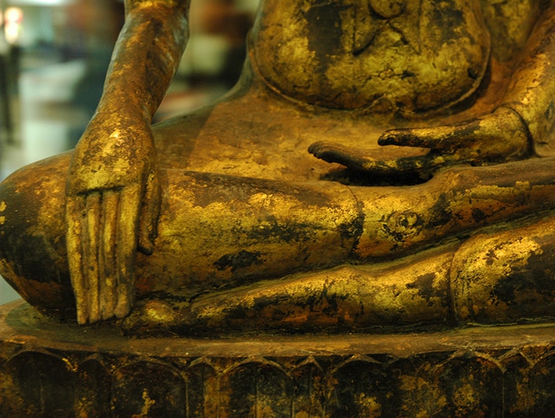 Journey to Wisdom Level 9, An image of a Buddha touching the ground, a symbol of fruition of the Buddhist path to wisdom