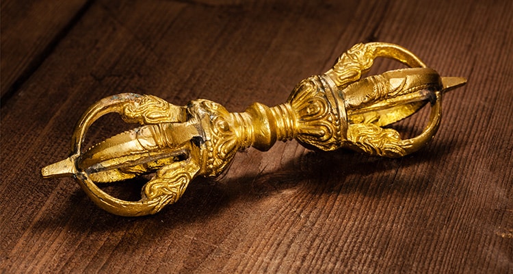 An image of a vajra, or 5-pointed Tibetan sceptre, which is a symbol of indestructibility and also emptiness